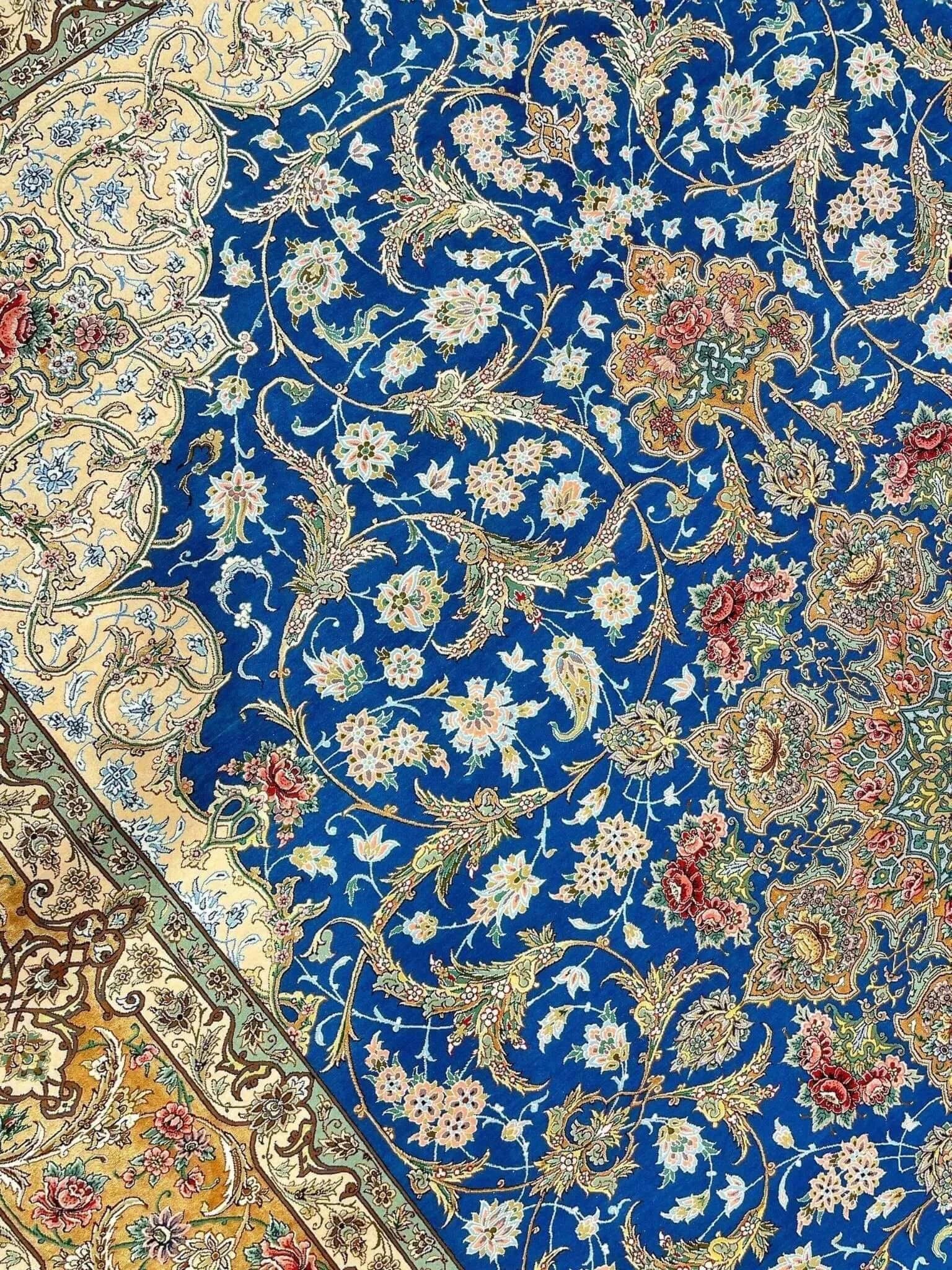 "Exquisite hand-knotted Isfahan rug, 11.5 x 8.2 feet, crafted from silk and wool with fine details."